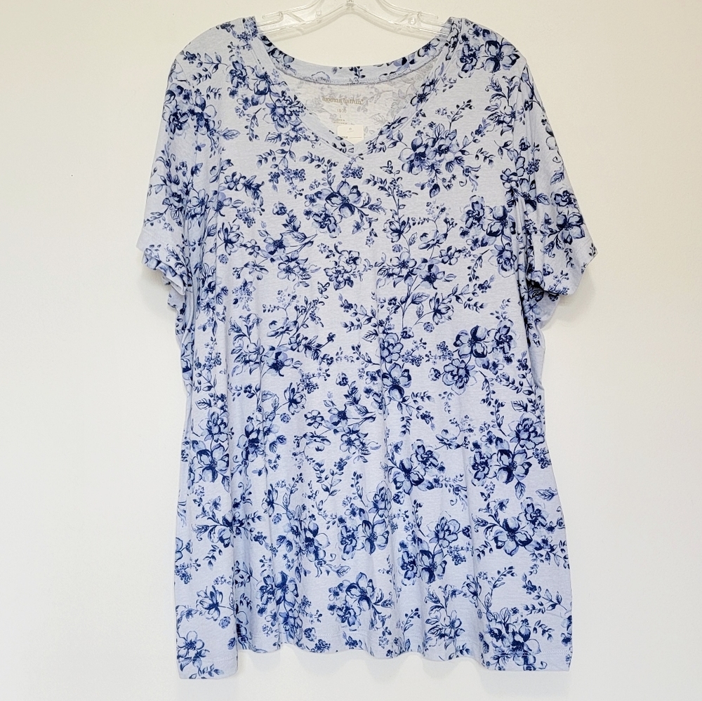 Woman within blue floral top